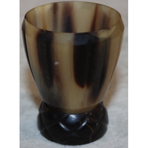 698 - A horn round trumpet shaped shot glass, 5.5cm high