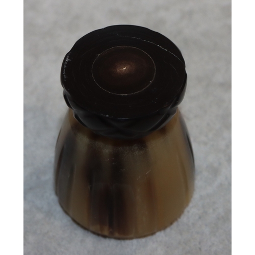 698 - A horn round trumpet shaped shot glass, 5.5cm high