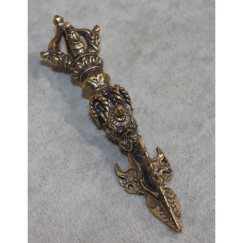 700 - A gilt metal small dagger with raised dragon decoration, 11cm long