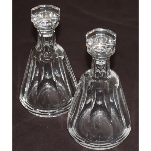 71 - A pair of Baccarat octagonal bulbous thin necked decanters with stoppers and chamfer decoration, 7 m... 