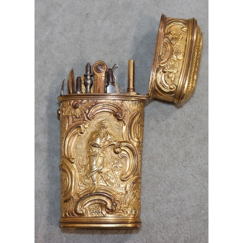 740 - A 19th Century gilt metal etui with allover embossed figure, animal, floral, leaf and scroll decorat... 