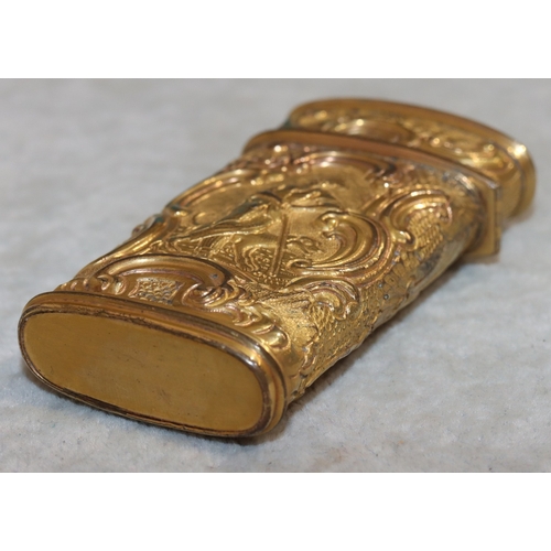 740 - A 19th Century gilt metal etui with allover embossed figure, animal, floral, leaf and scroll decorat... 