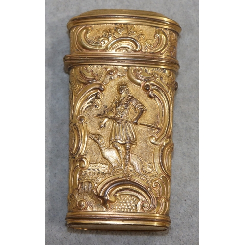 740 - A 19th Century gilt metal etui with allover embossed figure, animal, floral, leaf and scroll decorat... 