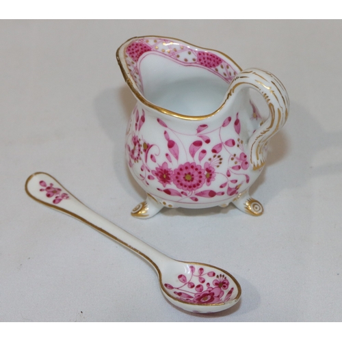 85 - A Meissen Indian purple pattern small spoon, 10.5cm long and a matching miniature round bulbous shap... 