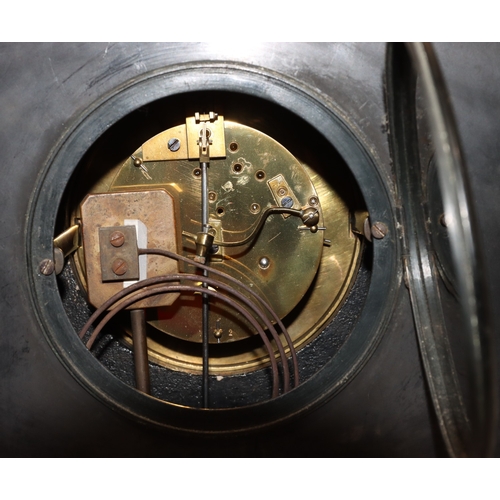 898 - A heavy black slate 8-day striking mantel clock with marble Egyptian sphinx to top, black dial surro... 