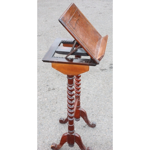 925 - A 19th Century rosewood reading table with hinged top, barley twist supports on splayed legs, 38.5cm... 