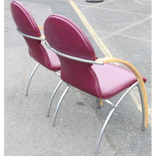 926 - A pair of Art Deco style red leather armchairs with chrome and maple wood style decoration, 64cm wid... 