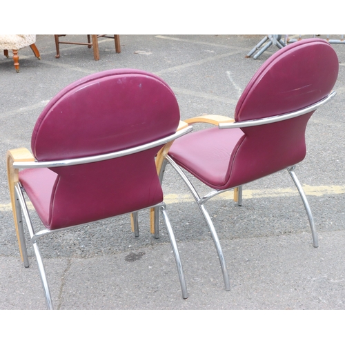 926 - A pair of Art Deco style red leather armchairs with chrome and maple wood style decoration, 64cm wid... 