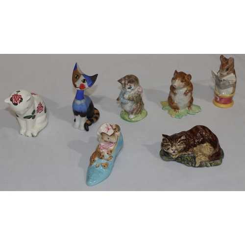 96 - A Goebel Art Deco figure of a seated cat, 10cm high, 4 Beatrix Potter figures, a Plichta figure of a... 