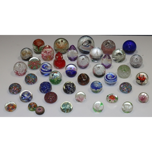 121 - 40 various glass bulbous and other paperweights, largest 9.5cm high