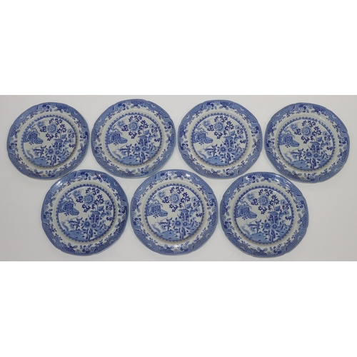 122 - A set of 7 19th Century Spode blue and white plates with Oriental fence, garden, bird and insect dec... 