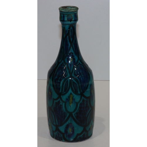 125 - A Safi earthenware round bulbous thin necked bottle on turquoise and blue ground, 14cm high