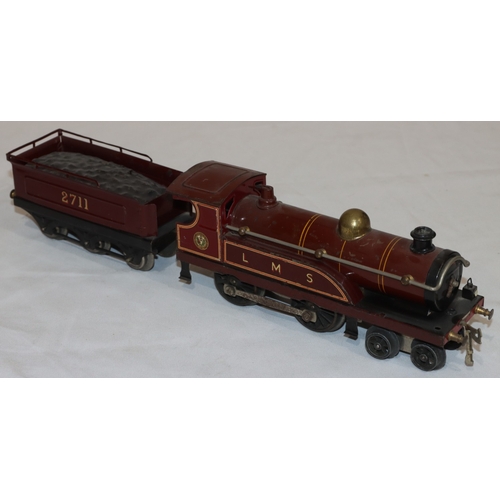 872 - A Hornby LMS 2711 0-Gauge locomotive with tender, 39.5cm long overall