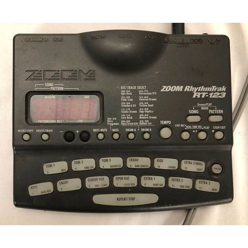 3066 - A Zoom RhythmTrak RT-123 Electronic drum machine,  Fostex model X-18 multitrack recorder, a Behringe... 