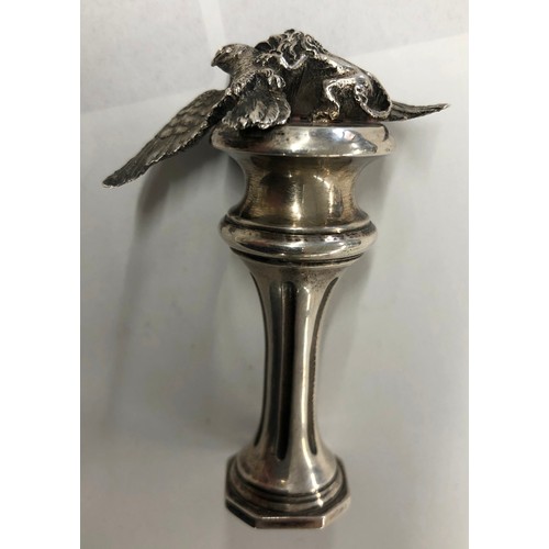 273 - A heavy Continental silver coloured metal desk seal with cast bird and lion motif to top, fluted ste... 