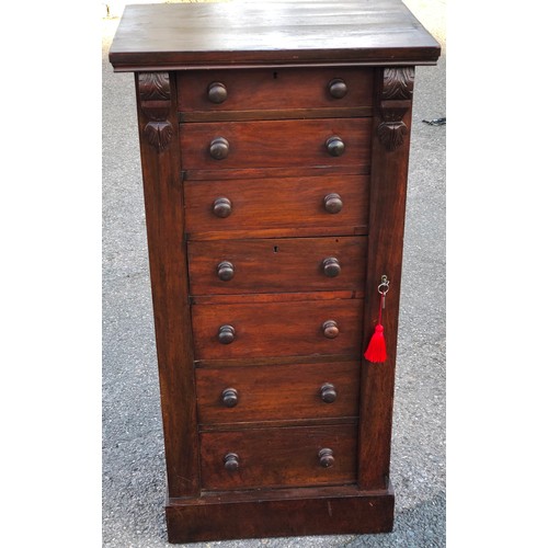 919 - A Victorian walnut Wellington chest with 7 graduated drawers with wood knob handles and lockable sid... 