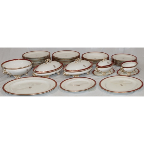 6001 - A Worcester dinner service on white ground with red rims and gilt key pattern decoration, all mounte... 