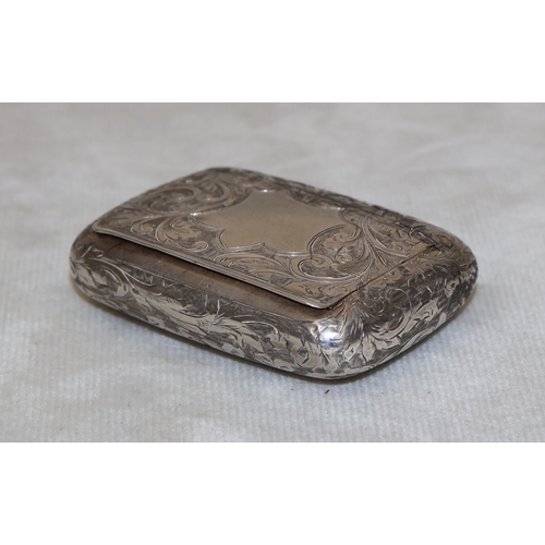173 - A late Victorian silver rectangular shaped snuff box with allover engraved scroll decoration, Birmin... 