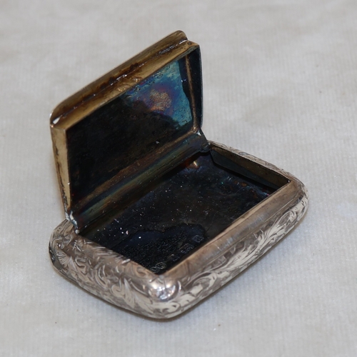 173 - A late Victorian silver rectangular shaped snuff box with allover engraved scroll decoration, Birmin... 