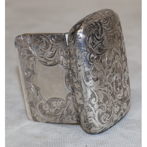 173 - A late Victorian silver rectangular shaped snuff box with allover engraved scroll decoration, Birmin... 