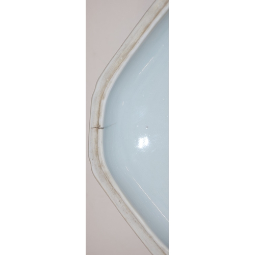 25 - A blue and white rectangular 2-handled lidded tureen with figure, river landscape and building decor... 