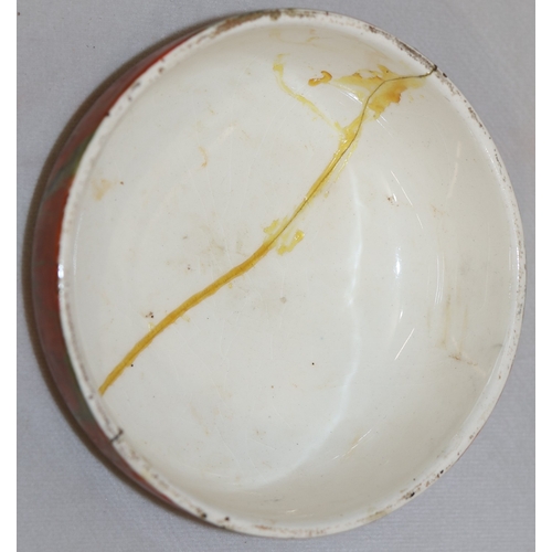 33 - A Crown Devon Art Deco round trumpet shaped shallow fruit bowl on green ground with multi-coloured f... 