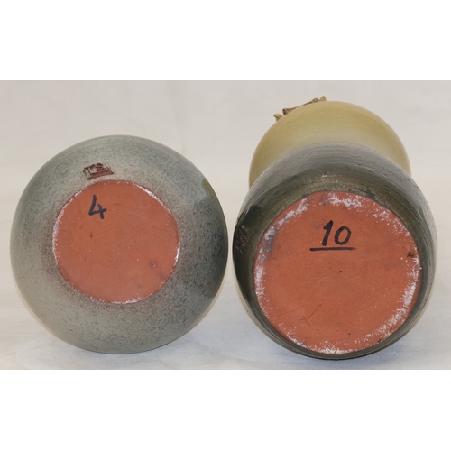 38 - A Studio Pottery round bulbous vase with raised floral and moon motifs, indistinctly signed, 31cm hi... 