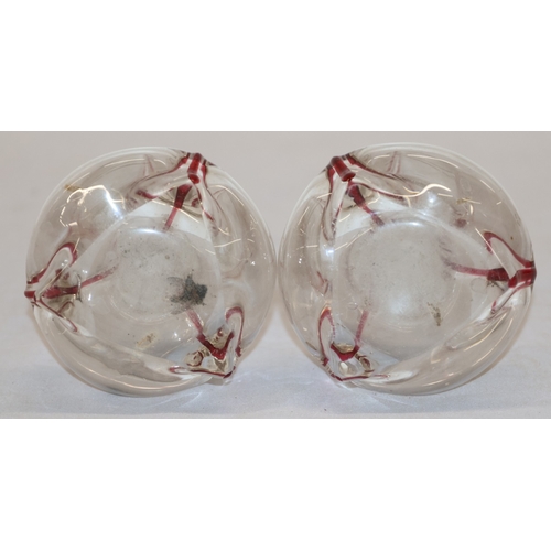 4 - A pair of round bulbous white and red glass spill vases with silver necks, 30.5cm high