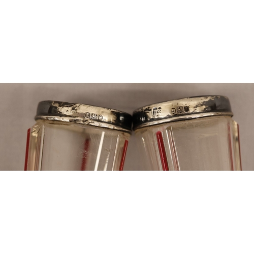 4 - A pair of round bulbous white and red glass spill vases with silver necks, 30.5cm high