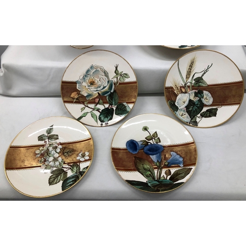 6021 - A set of Doulton Burselm floral patterned plates with gilt detail and 2 cake stands.