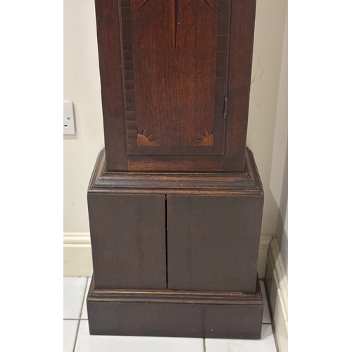 6061 - NOT HELD BY PFW. A longcase clock,216cm high, 55cm wide (wood split to base and needs a new weight l... 