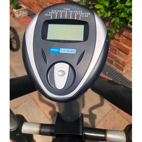 6030 - THIS ITEM IS NOT HELD BY PFW. A Pro-Fitness Exercise bike with adjustable seat, 143cm high overall, ... 
