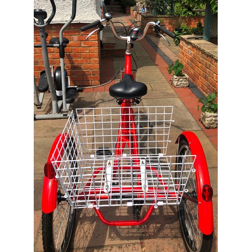 6031 - THIS ITEM IS NOT HELD BY PFW. A red SCOUT Adult Folding Tricycle with Basket (1 side of basket missi... 