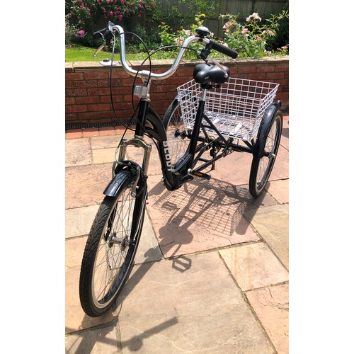 6032 - THIS ITEM IS NOT HELD BY PFW. A black SCOUT Adult Folding Tricycle with Basket, 6 Speed (some rust m... 