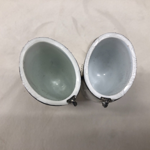 6011 - A  pair of 20th century Grenadier silver plated hunting boots shot measures with white liners. Marke... 