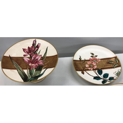 6021 - A set of Doulton Burselm floral patterned plates with gilt detail and 2 cake stands.