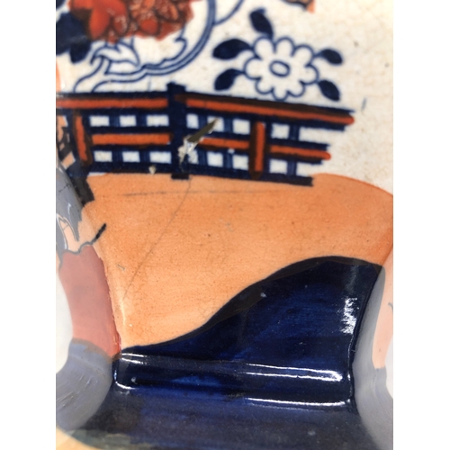 6022 - A Doulton Lambeth jug with silver rim, No. 8317, 17cm high, a small Mason's jug, 9.5cm high and 2 ot... 