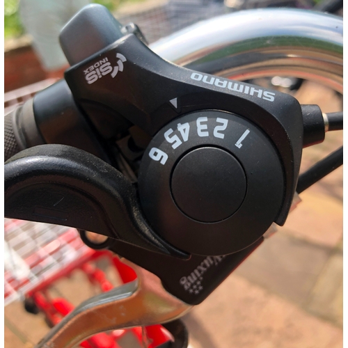 6031 - THIS ITEM IS NOT HELD BY PFW. A red SCOUT Adult Folding Tricycle with Basket (1 side of basket missi... 