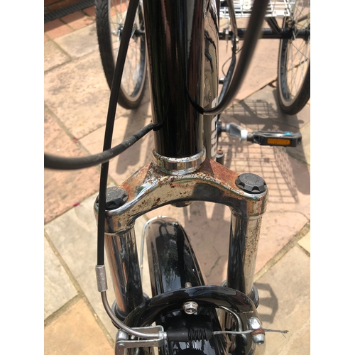 6032 - THIS ITEM IS NOT HELD BY PFW. A black SCOUT Adult Folding Tricycle with Basket, 6 Speed (some rust m... 