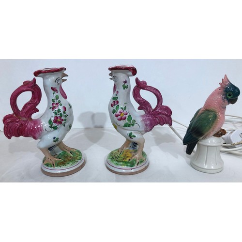 6039 - A pair of reproduction Majolica candlesticks in the form of cockerels, 23cm high and cockatoo lamp, ... 