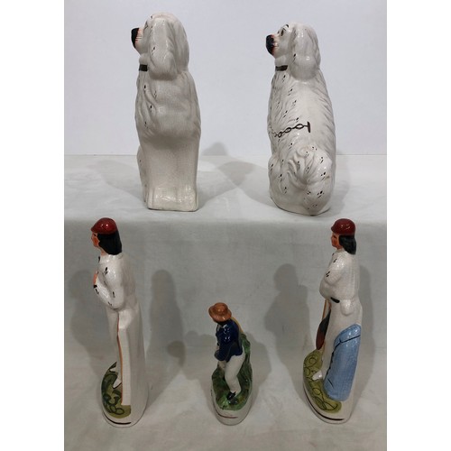 6041 - A pair of reproduction Staffordshire dogs, 29cm high (some cracks to back of heads, a pair of cricke... 