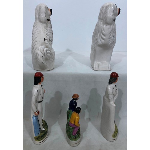 6041 - A pair of reproduction Staffordshire dogs, 29cm high (some cracks to back of heads, a pair of cricke... 