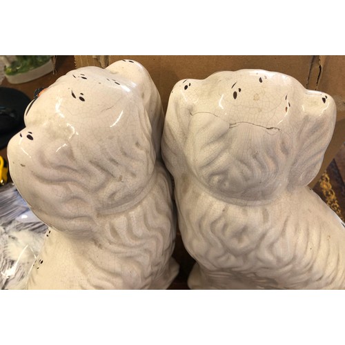6041 - A pair of reproduction Staffordshire dogs, 29cm high (some cracks to back of heads, a pair of cricke... 