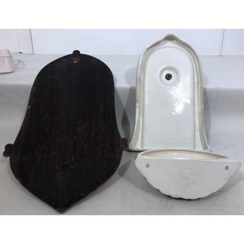 6047 - A wall mounted Portuguese hand painted ornate tap and sink on wood back, 83.5cm long. 41cm wide.