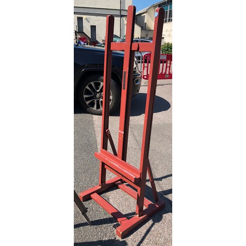 6050 - A large easel, 147cm high, 54.5cm wide, 48cm deep and 2 other easels (both a/f). (3)