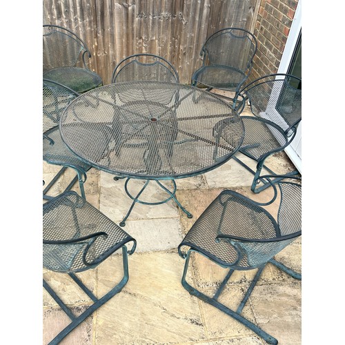 6054 - THIS ITEM IS HELD IN STORAGE. A  cast iron in Pompeian green finish circular garden table, 122cm dia... 