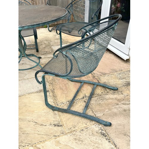 6054 - THIS ITEM IS HELD IN STORAGE. A  cast iron in Pompeian green finish circular garden table, 122cm dia... 