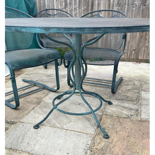 6054 - THIS ITEM IS HELD IN STORAGE. A  cast iron in Pompeian green finish circular garden table, 122cm dia... 