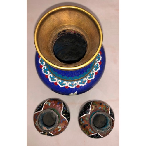 6055 - A Cloisonne vase, 26cm high and a pair of Cloisonne vases, 16cm high (both dented and damaged).