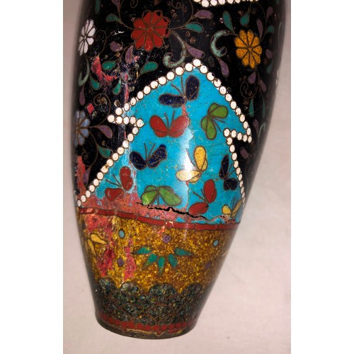 6055 - A Cloisonne vase, 26cm high and a pair of Cloisonne vases, 16cm high (both dented and damaged).